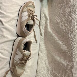New Balance Tan and White Sneakers
Intelligent choice 237